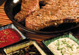 Image of Garlic Steak with a Trio of Dipping Sauces